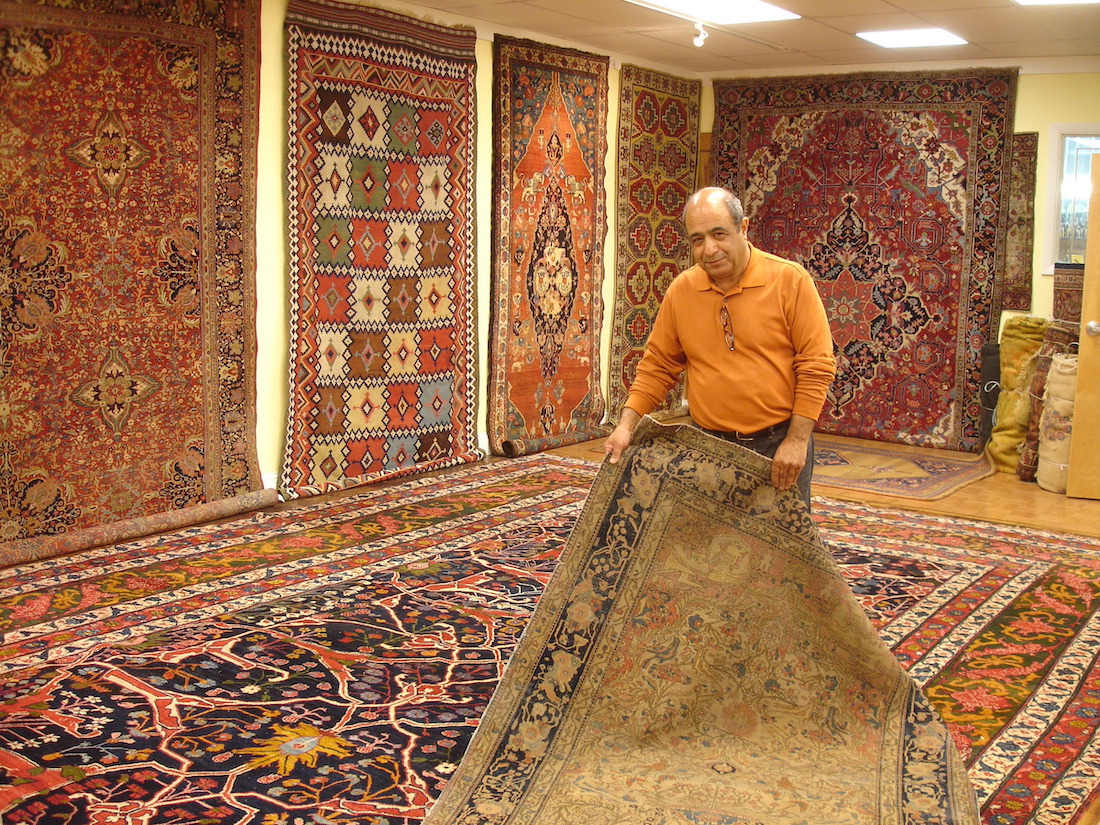 An old photo showing our antique oriental rug cleaning process.